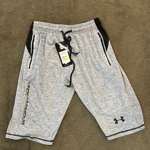 With tags - Under Armor men’s polyester long athletic shorts size XL
